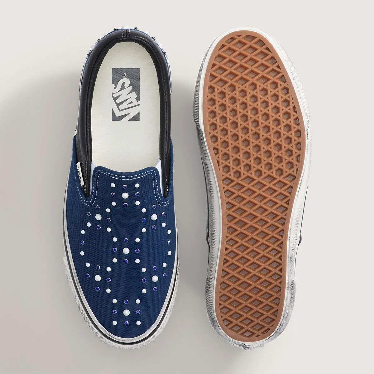 Vans Slip-On in Satoshi Nakamoto-inspired colorway, showing canvas upper and vulcanized sole detail - detail view 3
