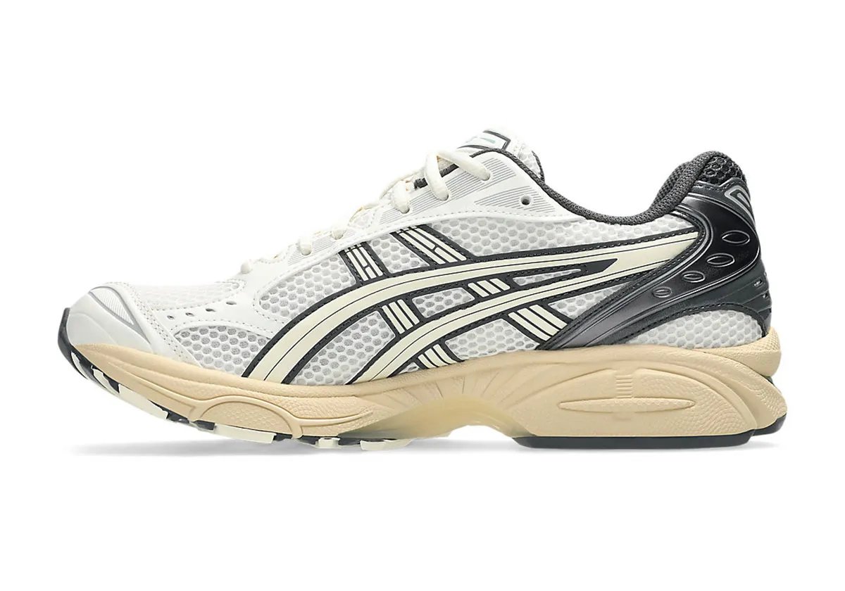 ASICS GEL-Kayano 14 in Cream and Obsidian Grey with jade green GEL cushioning accents, side profile view - detail view 2