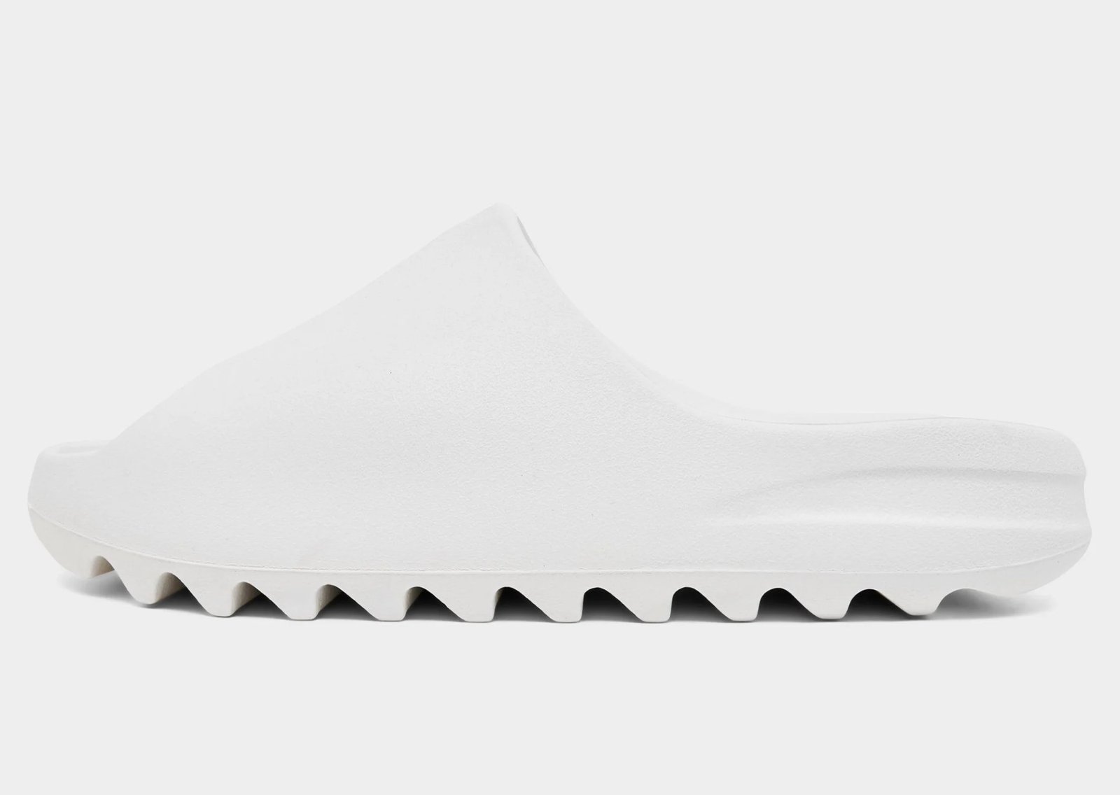 Yeezy Slide collection in multiple colorways releasing at JD Sports - detail view 4
