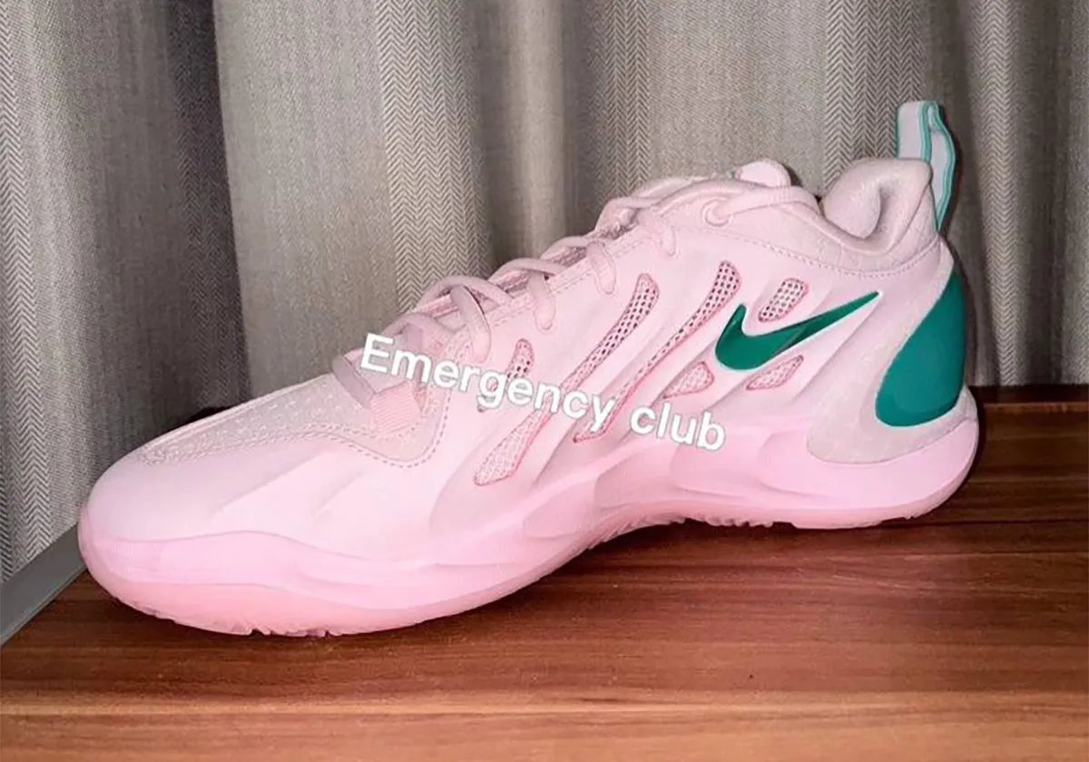 Nike A'Two MVP in pink and green colorway, featuring green heel counter and Swoosh accents with MVP pull-tab - detail view 1