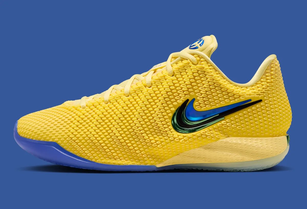 Nike Caitlin 1 'Warning Code' featuring yellow Opticast upper with racer blue accents and metallic green details on midsole - detail view 3