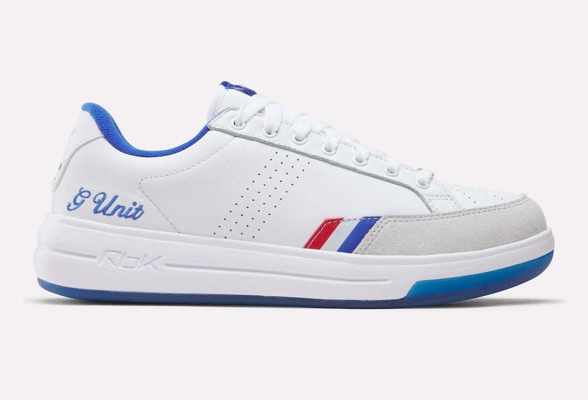 Reebok G-Unit G6 retro sneaker in white leather with light grey suede toe and royal blue accents, releasing August 2026 - detail view 3