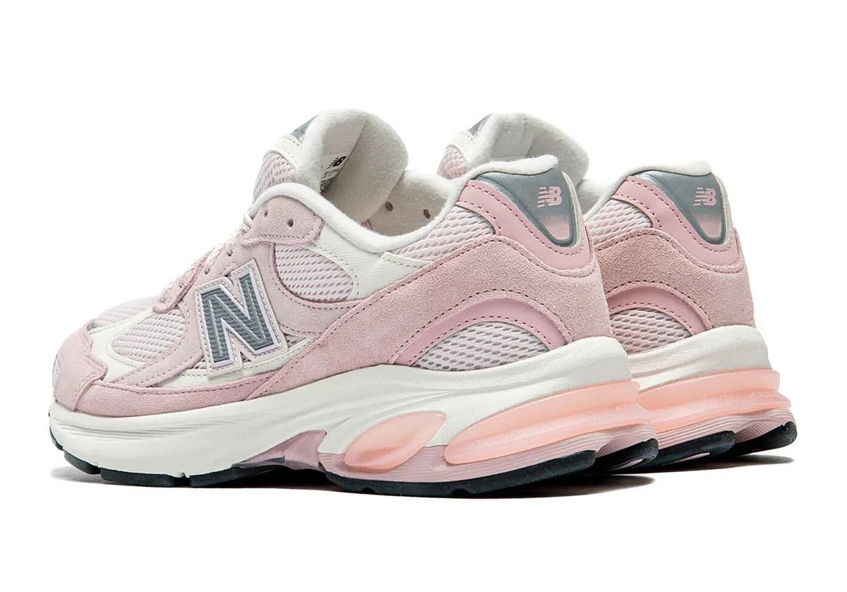 New Balance 2010 in Pink Chalk colorway, side profile view showcasing pastel tone and 99x-inspired design elements - detail view 2