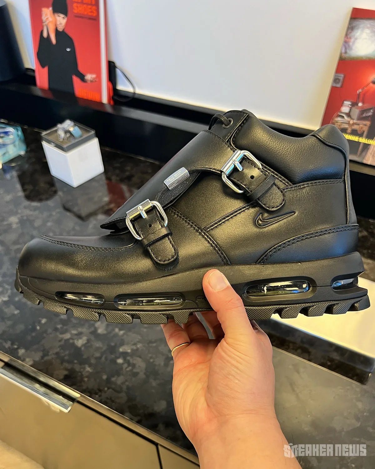 Public School NY x Nike Air Goadome in Triple Black with oversized metal buckle hardware detail on leather tongue