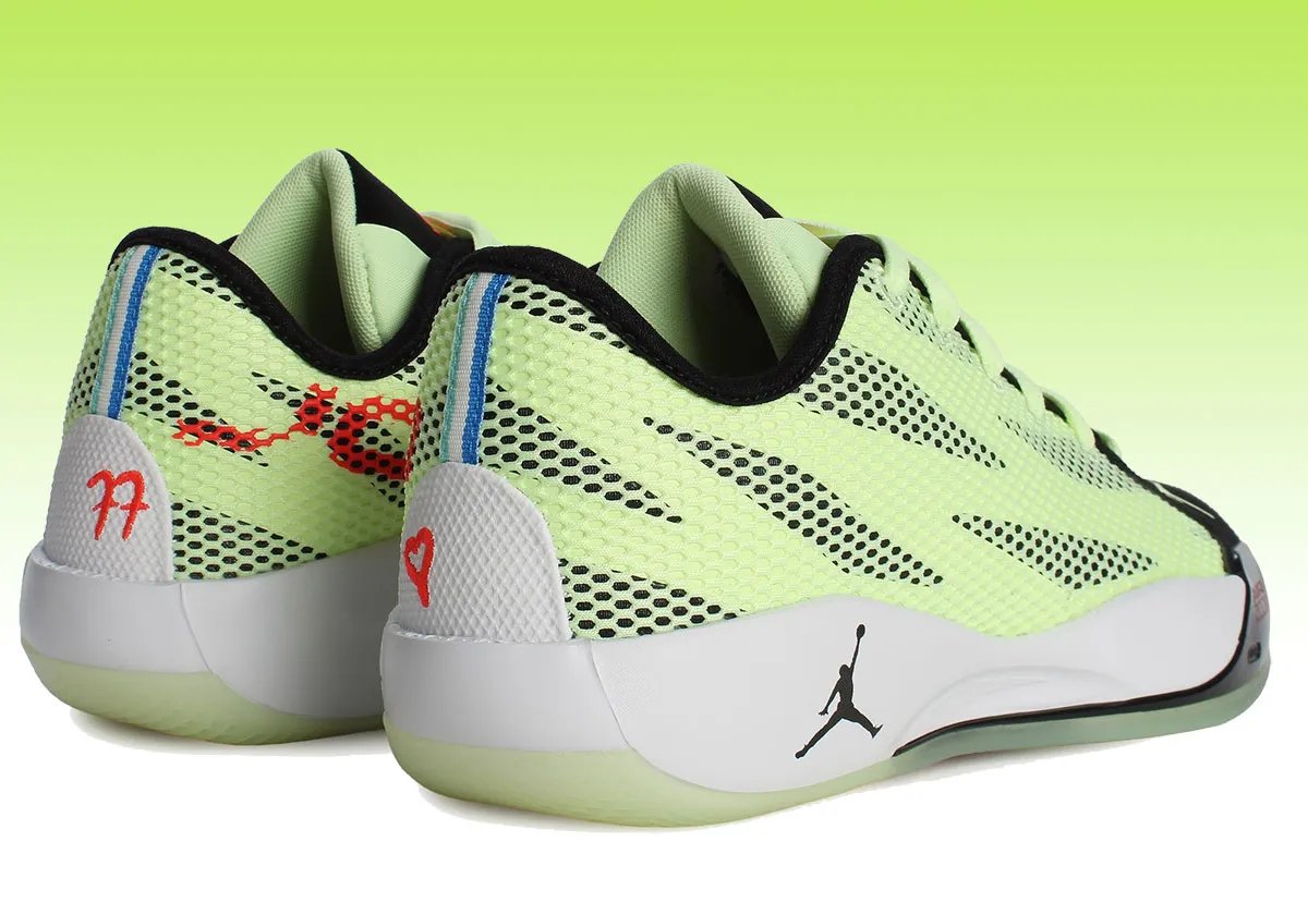 Jordan Luka .77 in Barely Volt and Infrared 23 colorway with jet-black midline accents - detail view 4