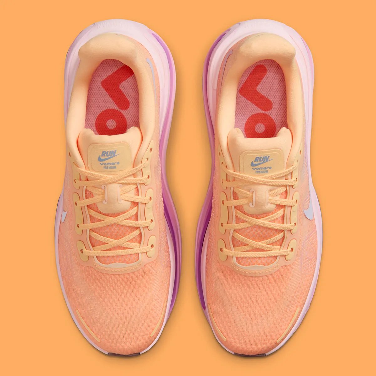 Nike Vomero Premium in Tangerine Tint colorway, showing side profile of the premium lifestyle running shoe - detail view 3