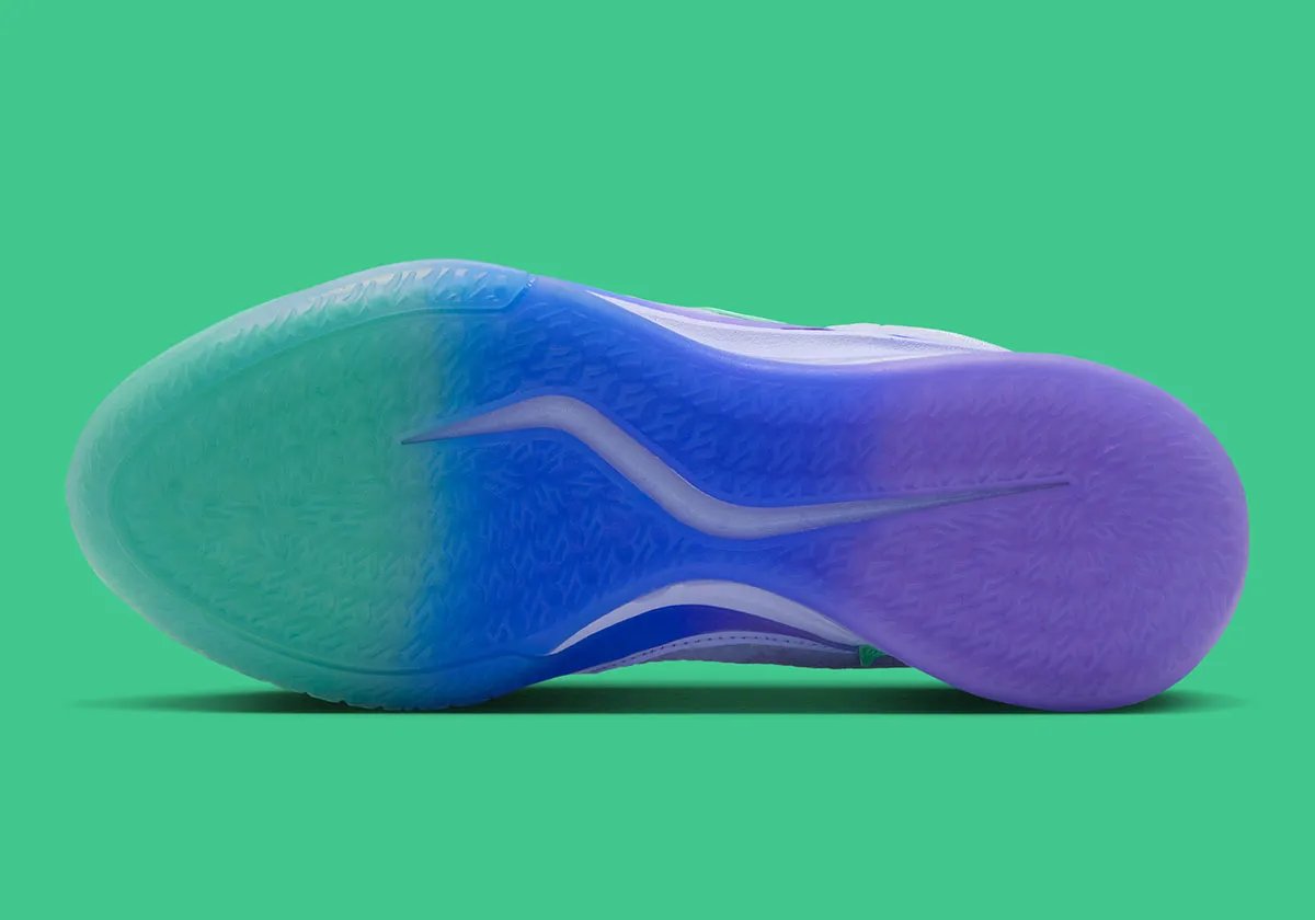 Nike Sabrina 4 Superstition colorway featuring pale purple upper with tri-tone gradient of Liberty green, royal blue, and metallic purple on the outsole and Swoosh - detail view 5