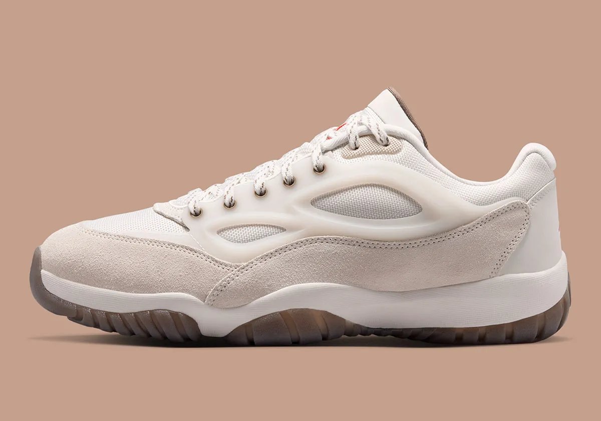 Jordan Dimension 95 Phantom showing perforated TPU cage, suede toe cap, and Red Swan outsole detailing - detail view 1