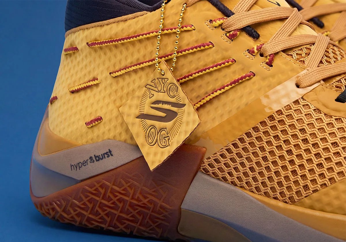 Skechers SKX Reign 'Foreman' player exclusive for OG Anunoby in wheat Timberland-inspired colorway with yellow and red heel cables - detail view 1