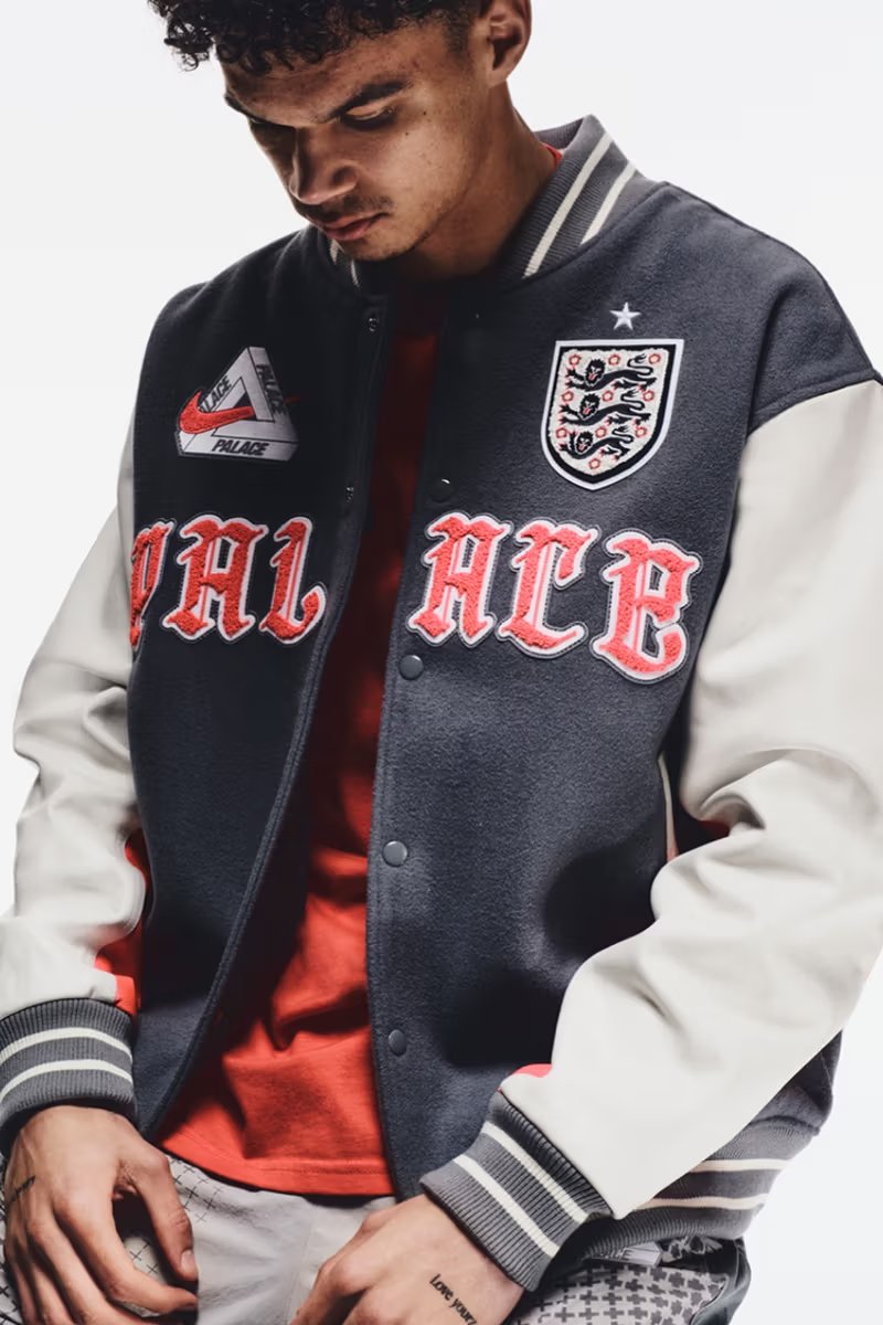 Palace x Nike The Three Lions capsule featuring leather varsity jacket and silver anthem zip-up for England national team - detail view 2