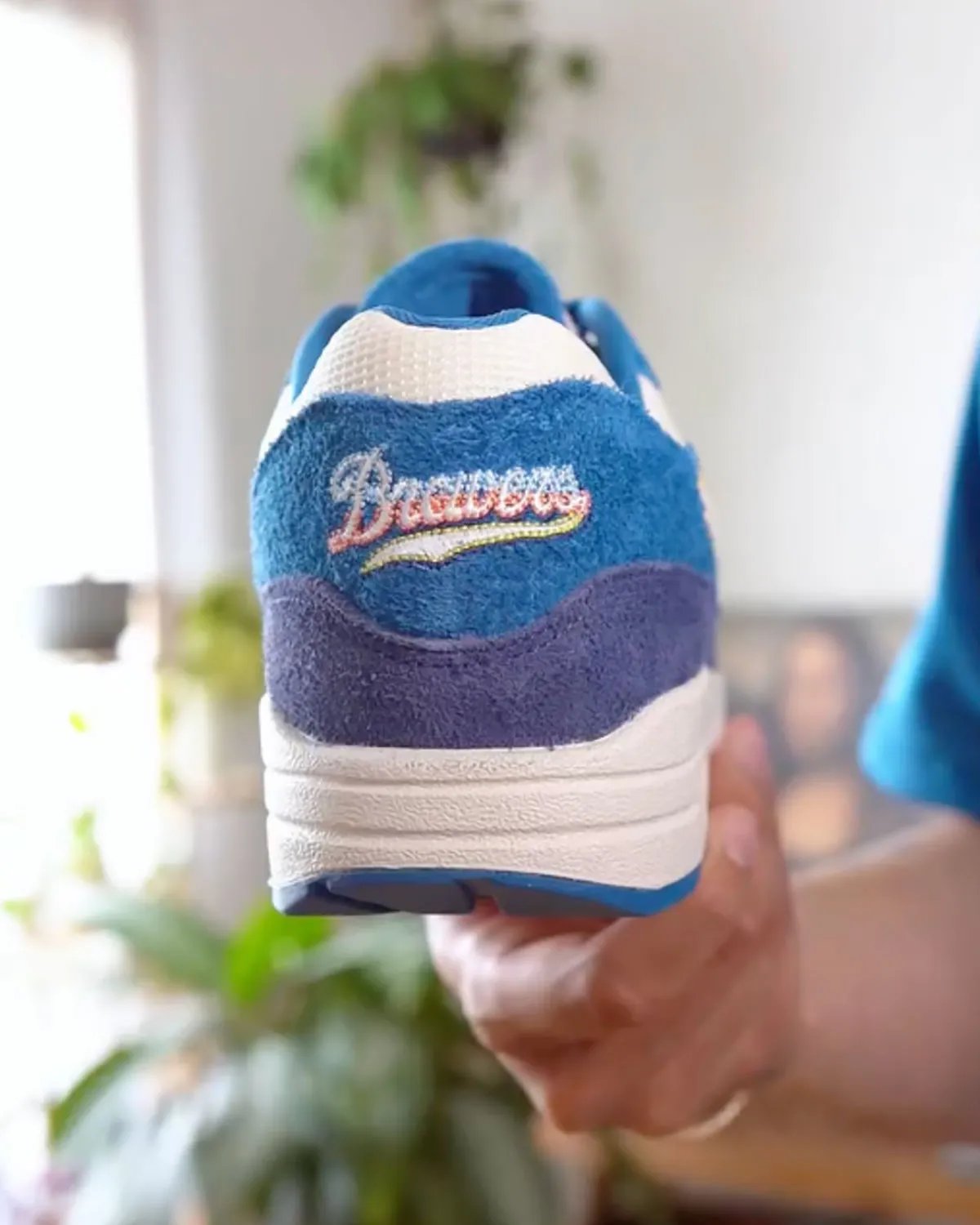 Nike Air Max 1 in Brewers City Connect colorway featuring blue suede upper with rainbow-trimmed Swoosh - detail view 3