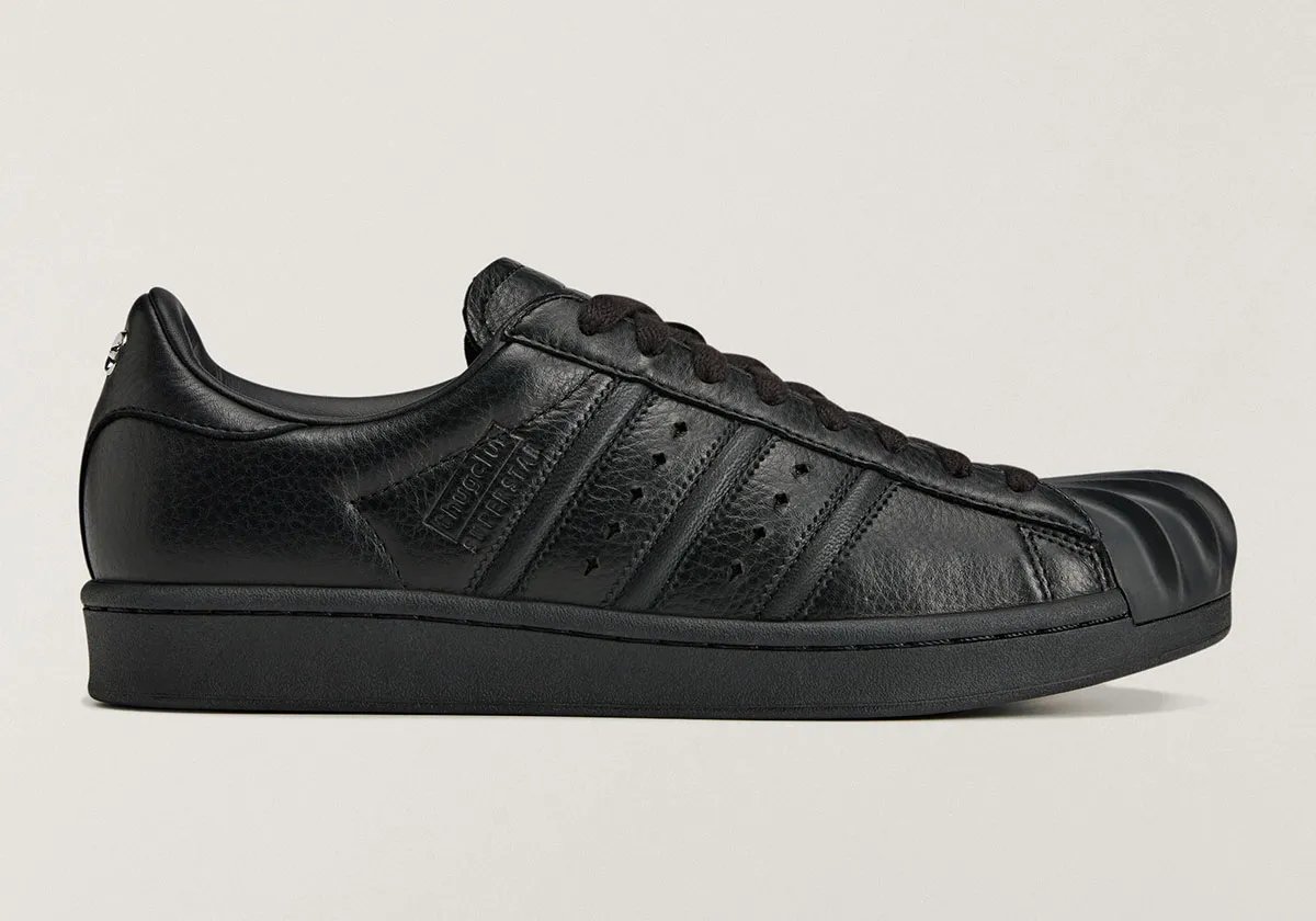 Thug Club x adidas collaborative capsule collection featuring reworked classic adidas silhouettes with distressed design details - detail view 1