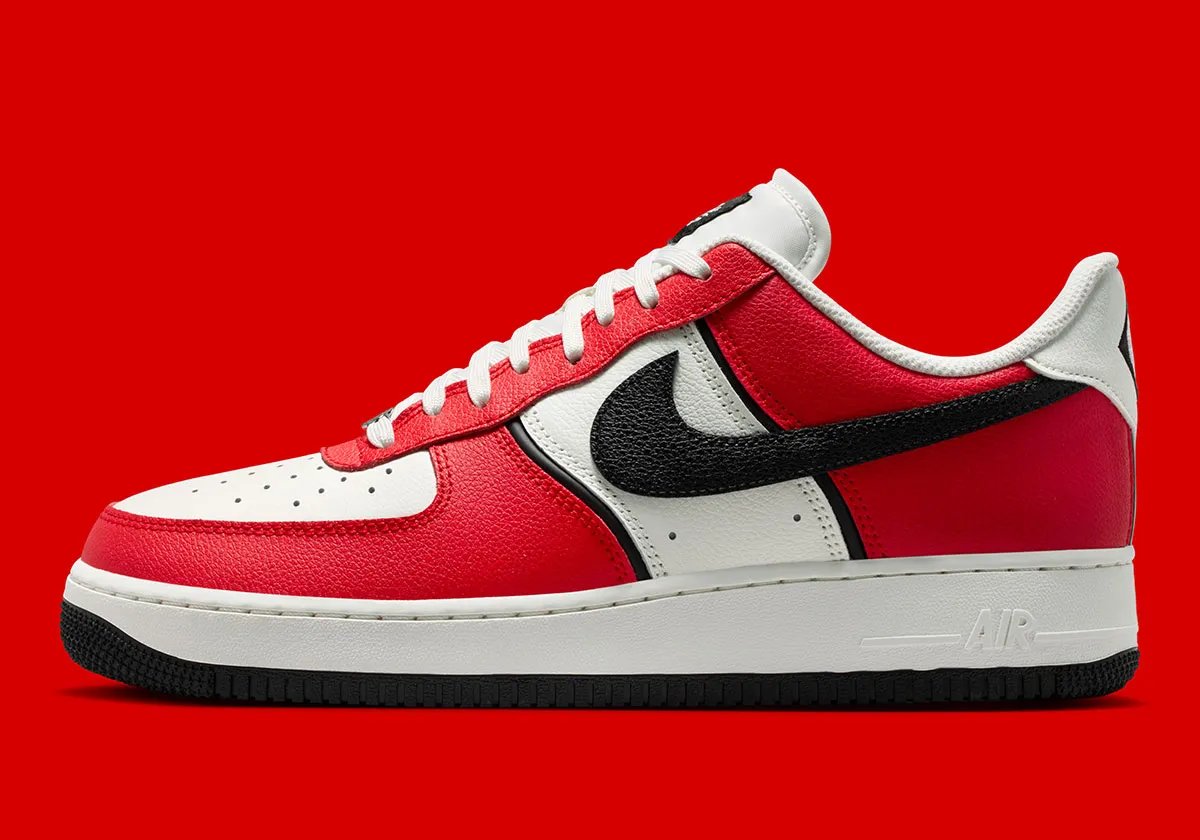 Nike Air Force 1 Low in University Red and black with diamond heel branding and Sail quarter panel - detail view 1