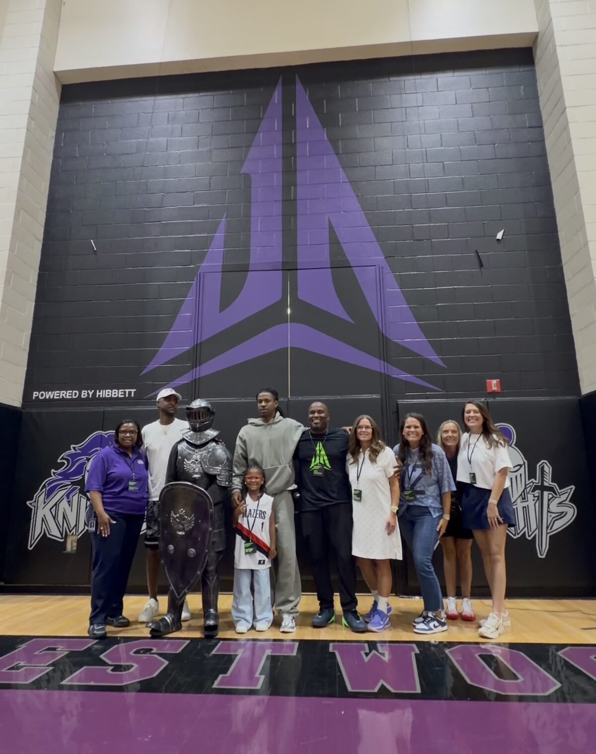 Ja Morant and his daughter Kaari unveil a Nike Ja logo at Crestwood High School during the Nike Ja 4 Dark Mode and Ja Twelve Time launch weekend in Sumter, South Carolina - detail view 1