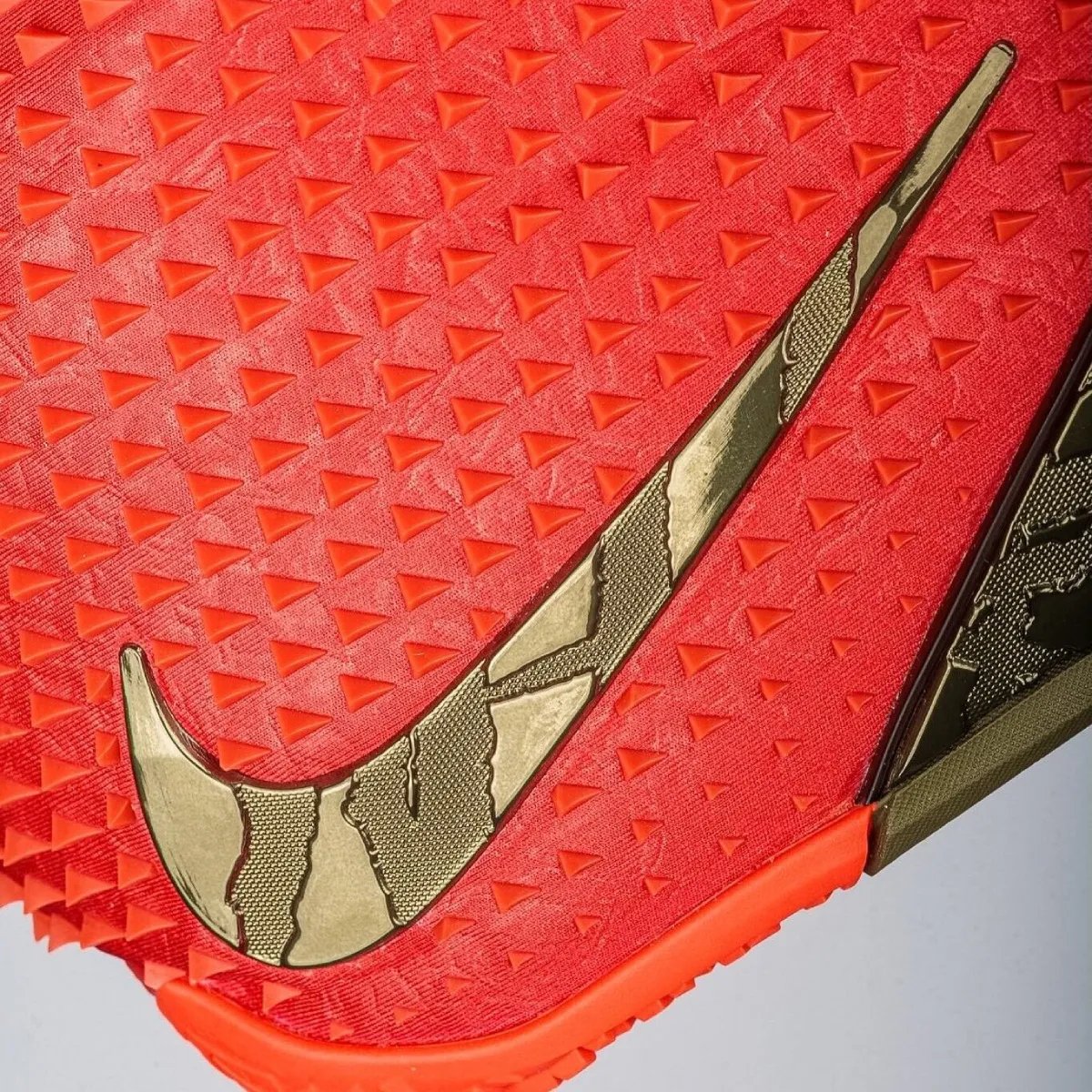 Nike Ja 4 High in University Red with zippered shroud and textured TPU details - detail view 4