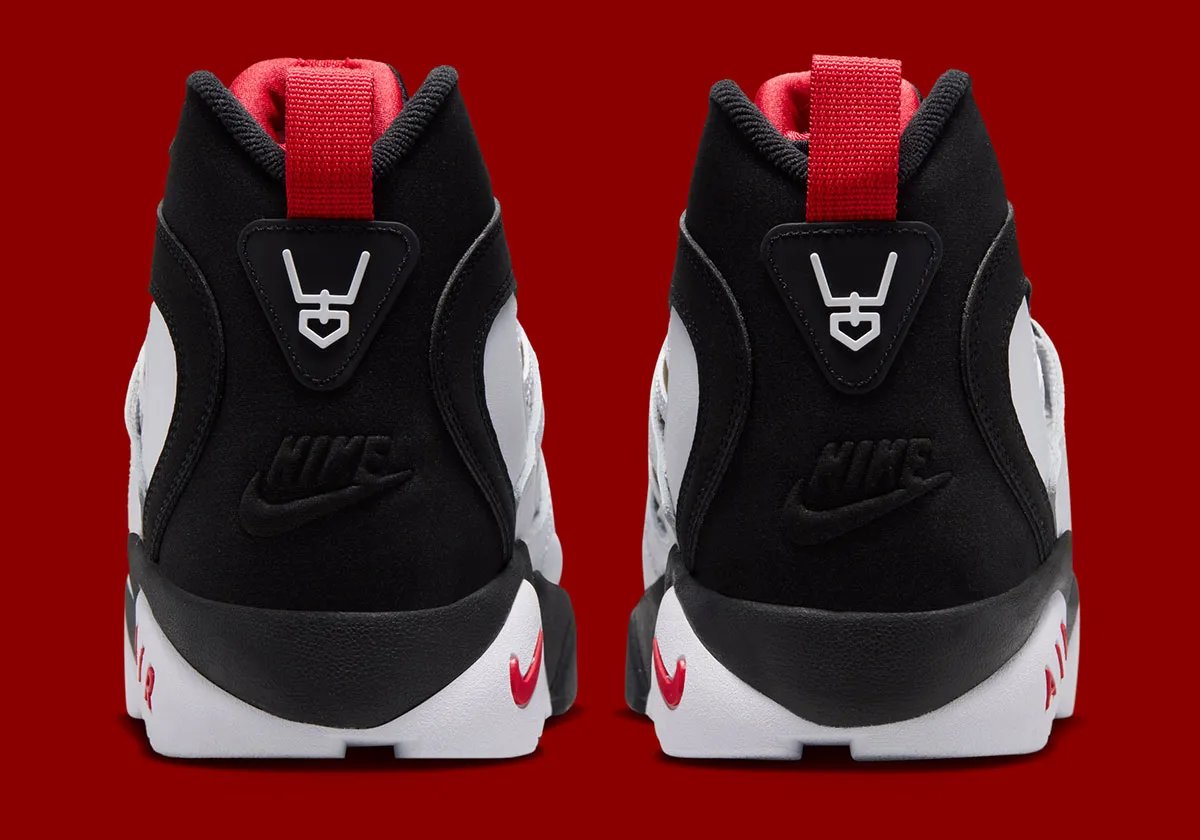 Nike Air Diamond Turf II '49ers' retro sneaker with black leather, white side panels, gold mesh, and red branding details - detail view 5