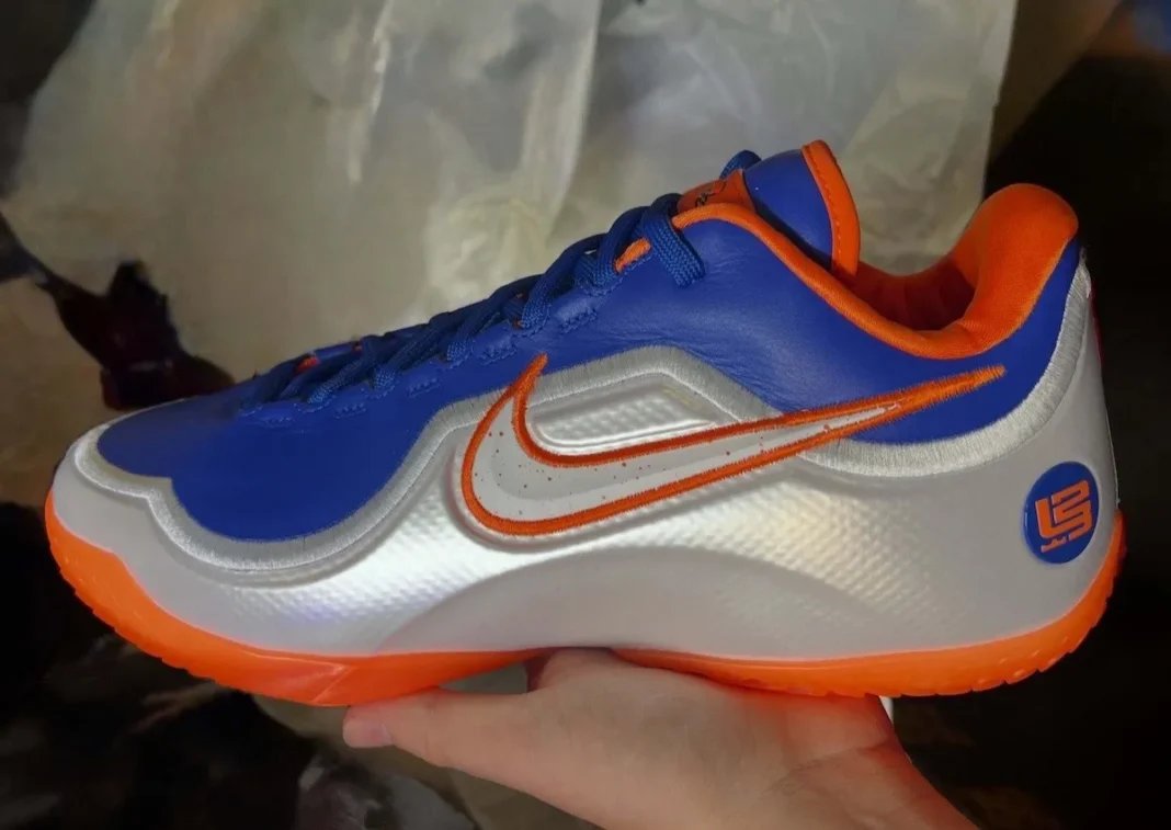 Nike LeBron 23 'Hardwood Classic' mismatched Game Royal and Safety Orange colorway inspired by Cavaliers Hardwood Classics uniforms - detail view 1