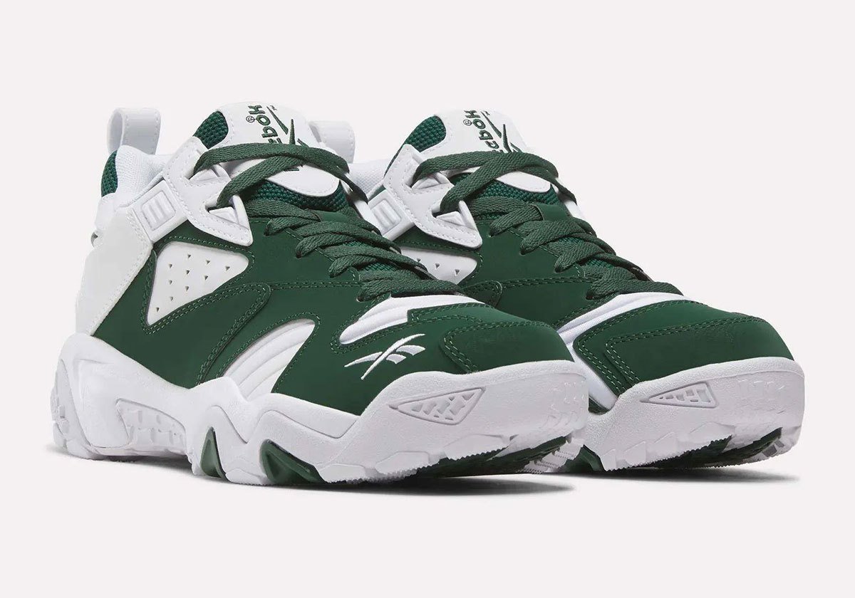 Reebok Brutus Lo in pine green and white Philadelphia Eagles colorway, showing side profile and detail of toe cap and tongue