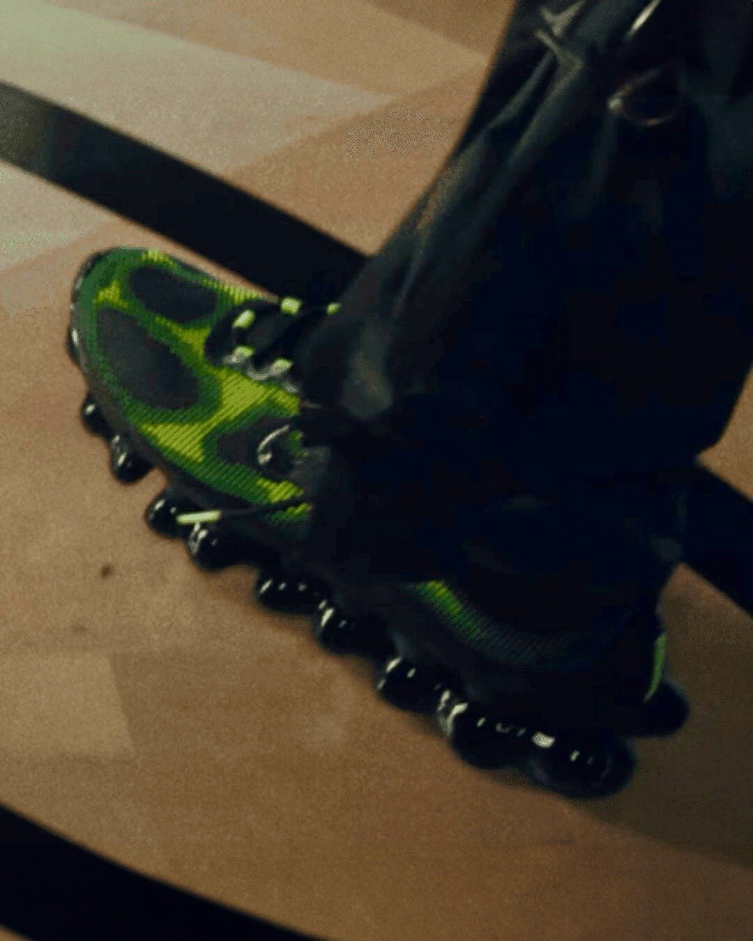 Nike Air Liquid Max Green Apple colorway with sculpted upper design and air unit cushioning - detail view 2