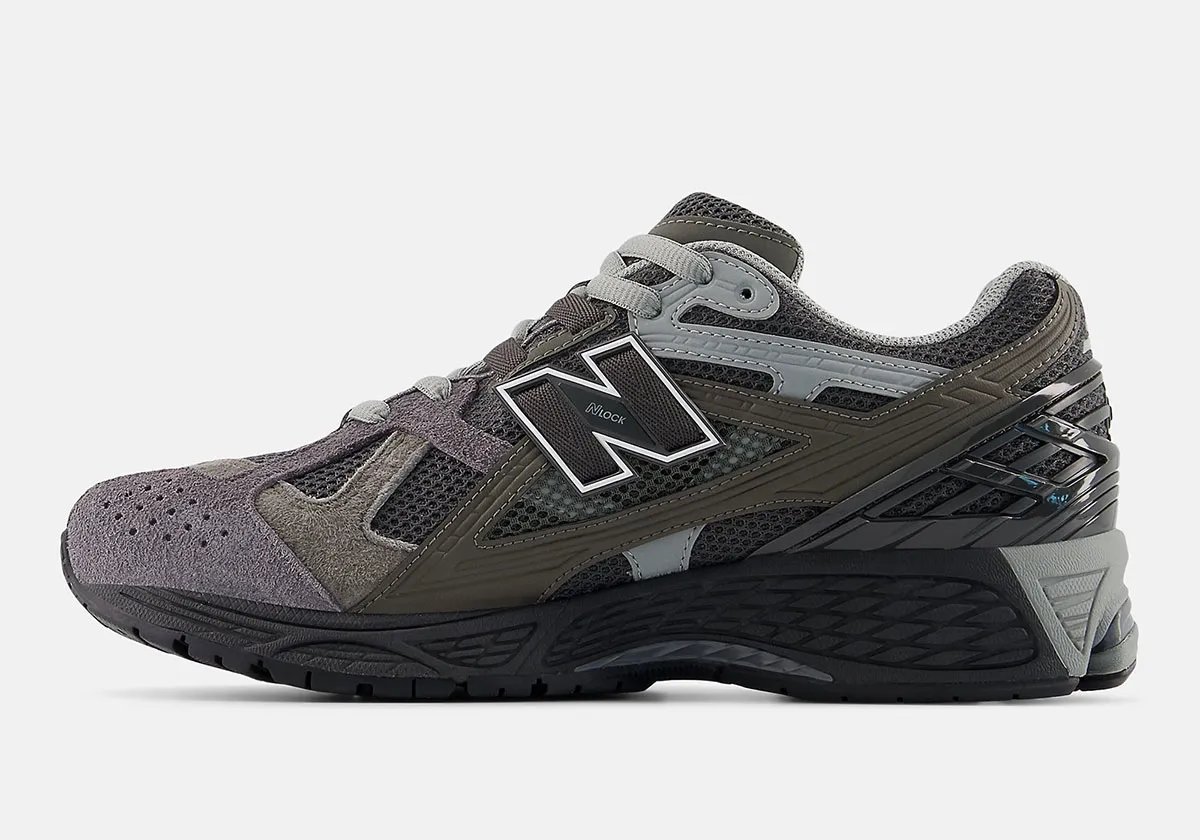 New Balance 1906U in Tornado Grey with layered grey tones and silver hardware accents - detail view 2