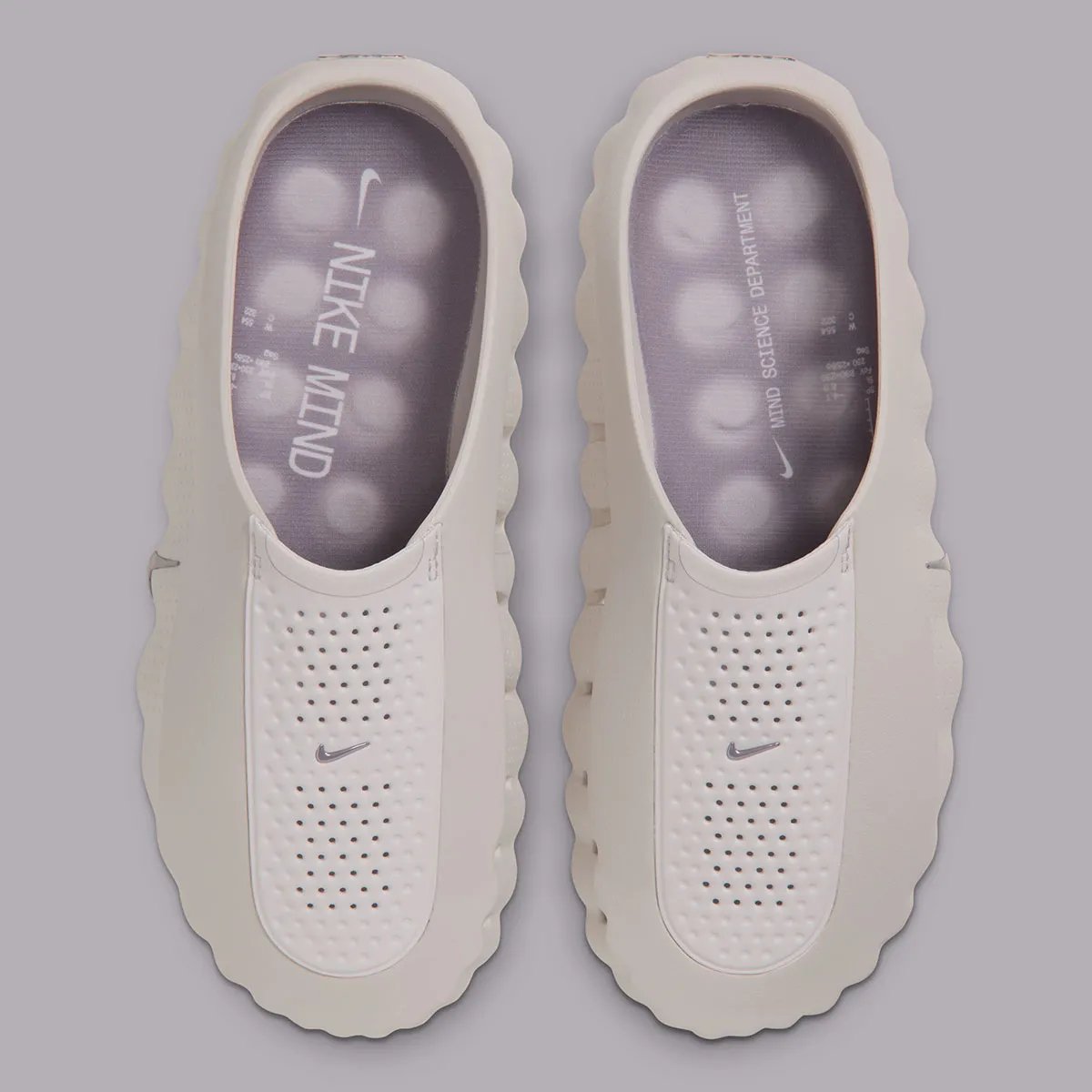 Nike Mind 001 mule in Purple Smoke colorway with Silver Lilac insoles and foam nodes visible on the sole. - detail view 4