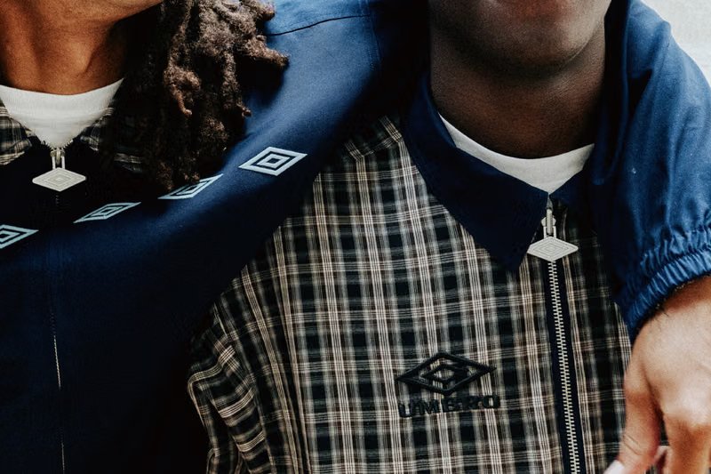 PLEASURES x Umbro capsule collection featuring oversized football shirts and track jackets inspired by 1990s British terrace and music culture - detail view 3