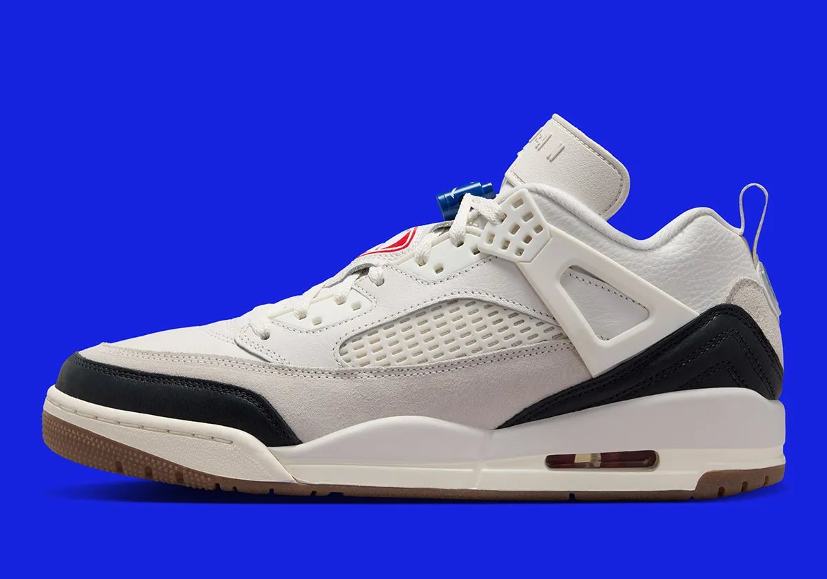 Jordan Spiz'ike Low FC in University Red and Sail with Nike Football logo on tongue and gum brown outsole - detail view 2