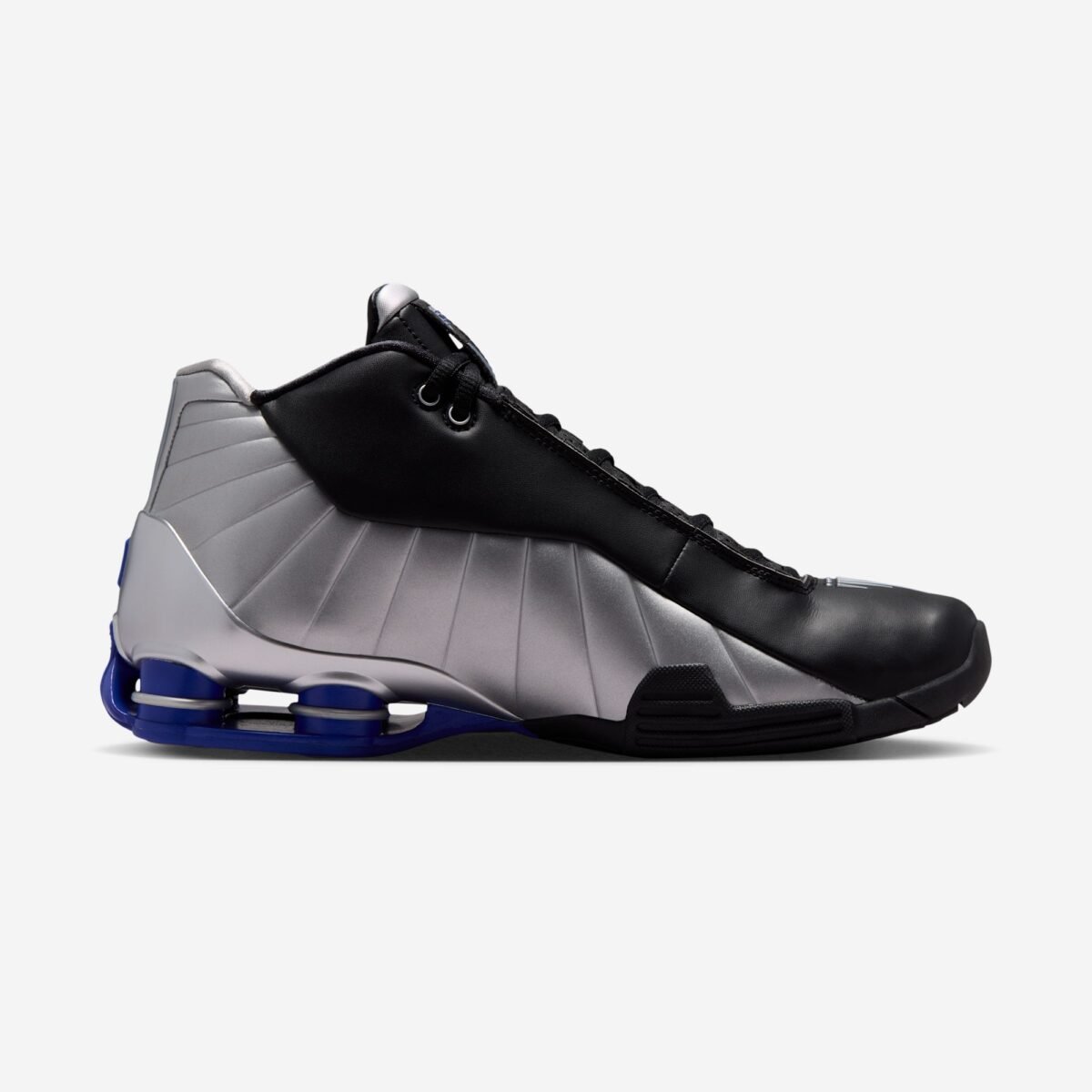 Nike Shox BB4 in Black and Metallic Silver colorway, showcasing the classic Shox cushioning platform and court-ready silhouette - detail view 3