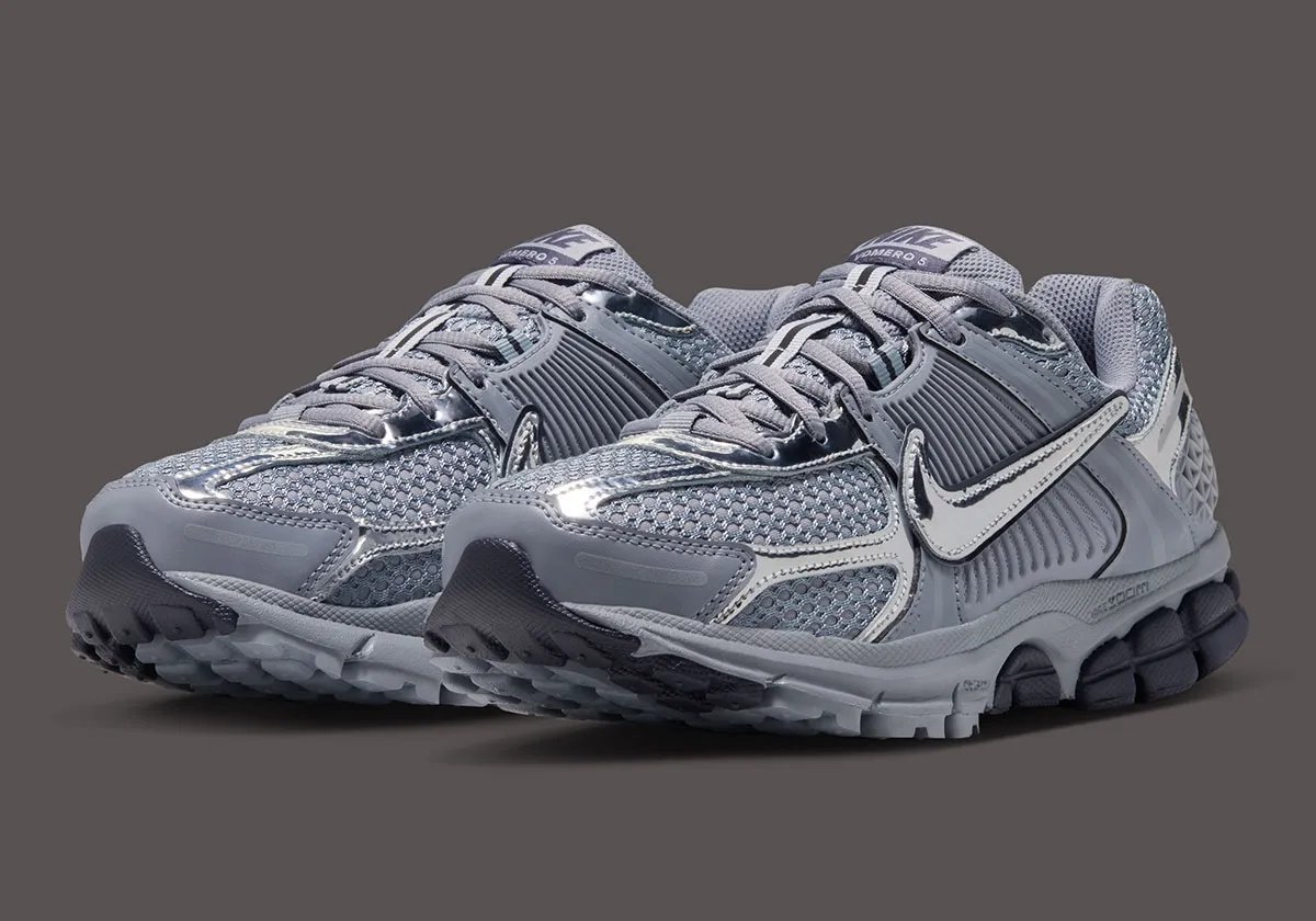 Nike Zoom Vomero 5 Gridiron in dark grey with reflective chrome overlays and black traction unit
