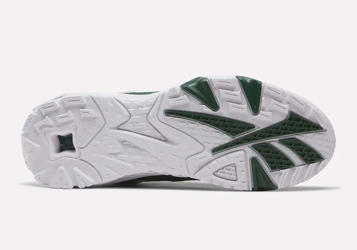 Reebok Brutus Lo in pine green and white Philadelphia Eagles colorway, showing side profile and detail of toe cap and tongue - detail view 3