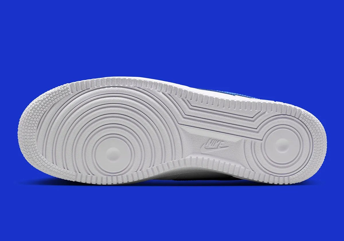 Nike Air Force 1 Low in White with Game Royal carbon fiber Swoosh and accents, lateral view - detail view 2