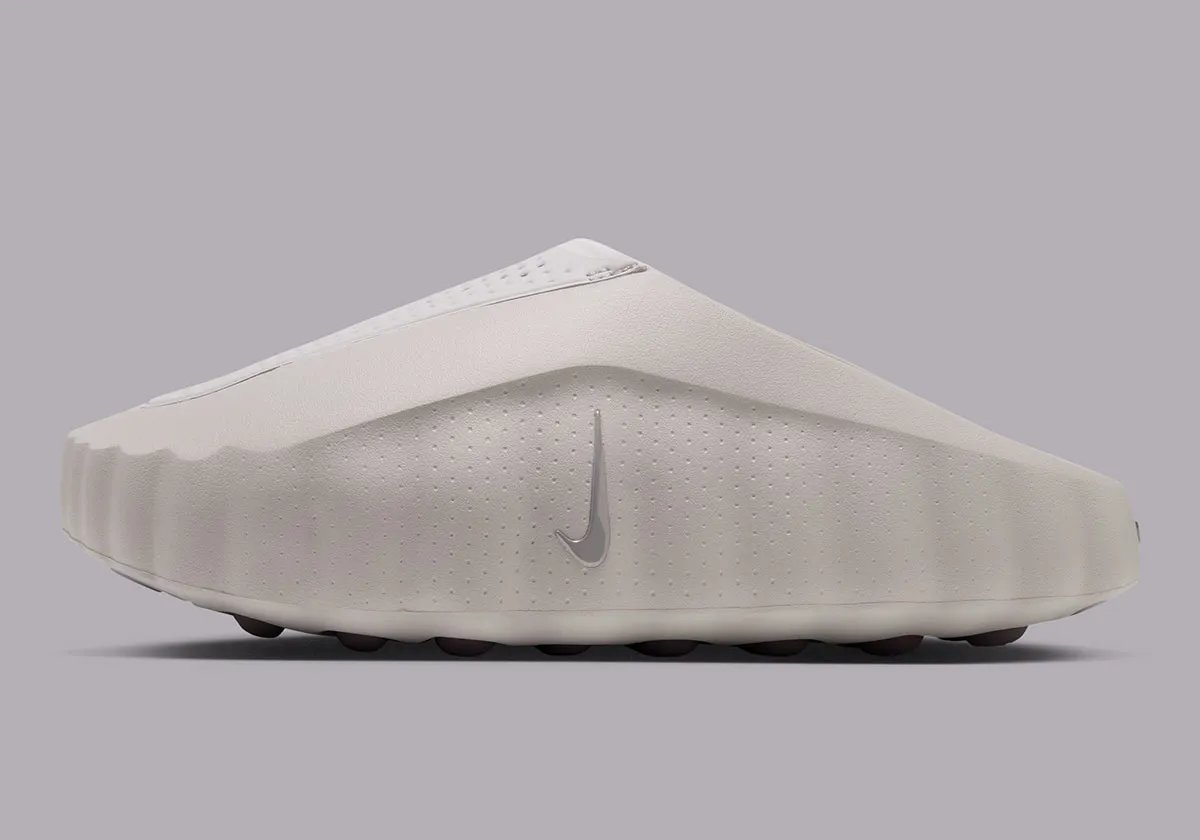 Nike Mind 001 mule in Purple Smoke colorway with Silver Lilac insoles and foam nodes visible on the sole. - detail view 1