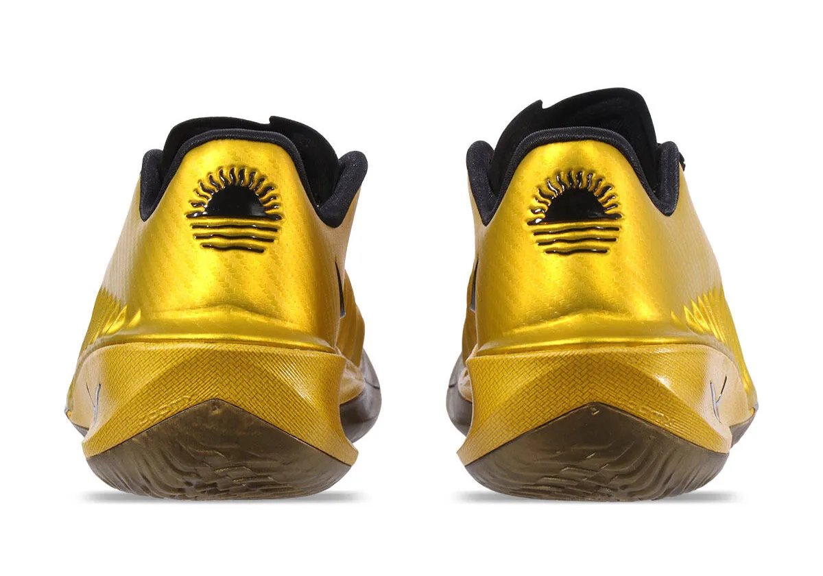 Nike GT Cut 4 in Jordan Poole's gold colorway with black trim and bronze translucent outsole - detail view 3