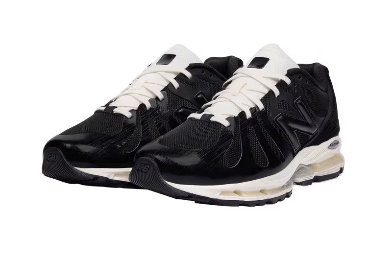 JJJJound x New Balance 1890 in black and silver colorways, side profile view showing technical '90s runner construction - detail view 3