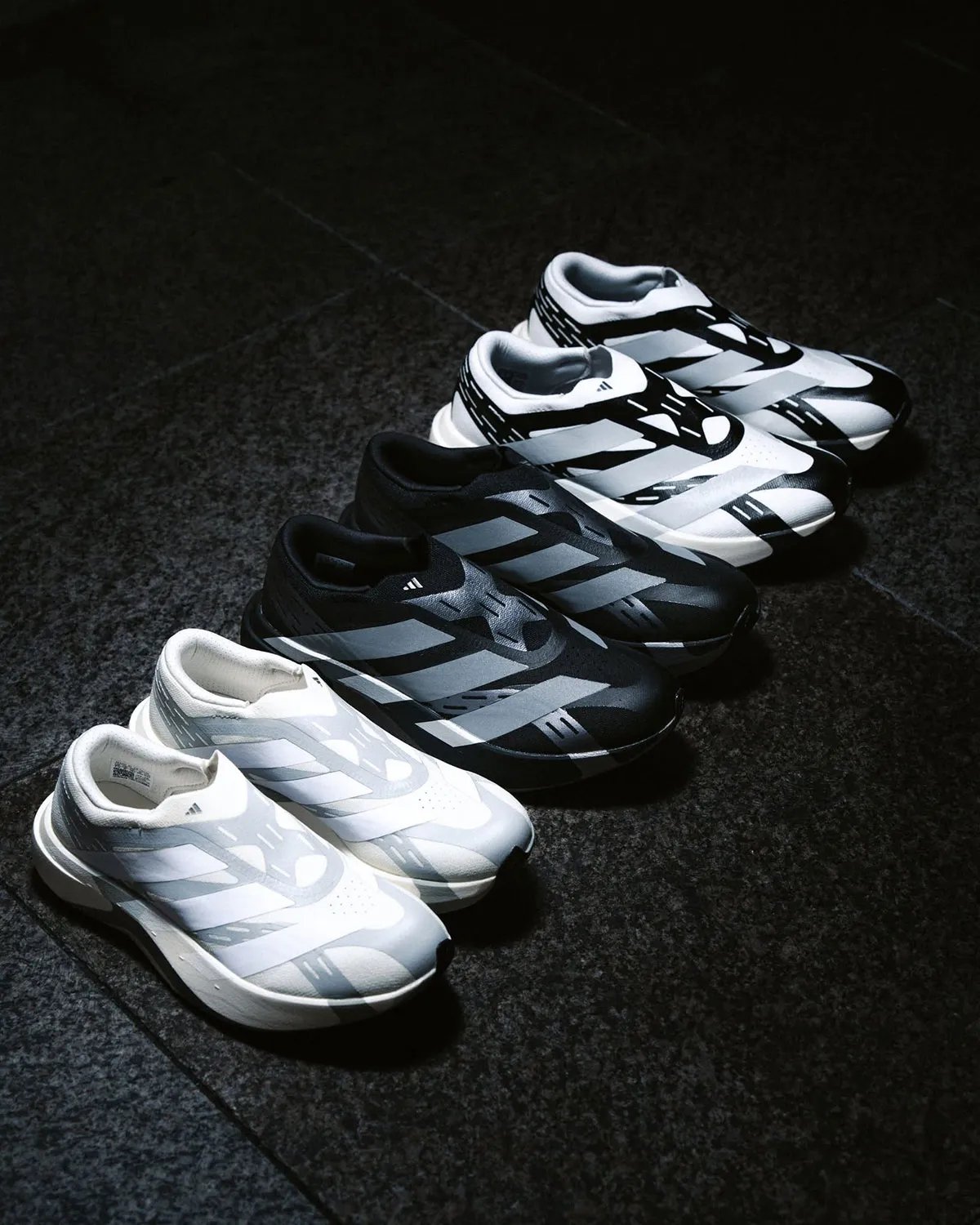 adidas EVO SL Laceless in profile, showing reinforced synthetic layers and minimal sock-collar construction