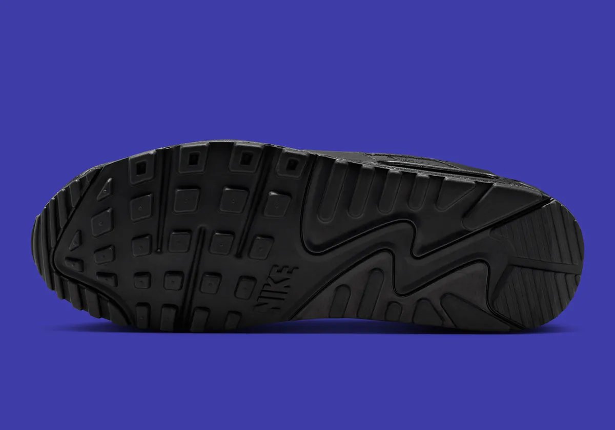 Nike Air Max 90 in Black/Sapphire colorway, showing visible Air Unit and side profile - detail view 2