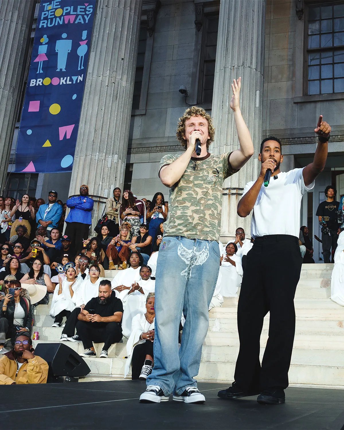 Models and emerging designers wearing Converse Chuck Taylor Throwback silhouettes during KidSuper's The People's Runway at Brooklyn's Borough Hall during NYFW 2025 - detail view 4