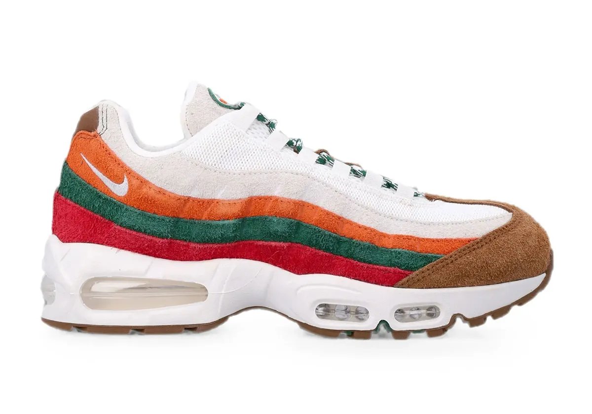 Nike Air Max 95 in 7-Eleven-inspired colorway with Gym Red, Sport Green, and Total Orange suede overlays and Light British Tan accents - detail view 1