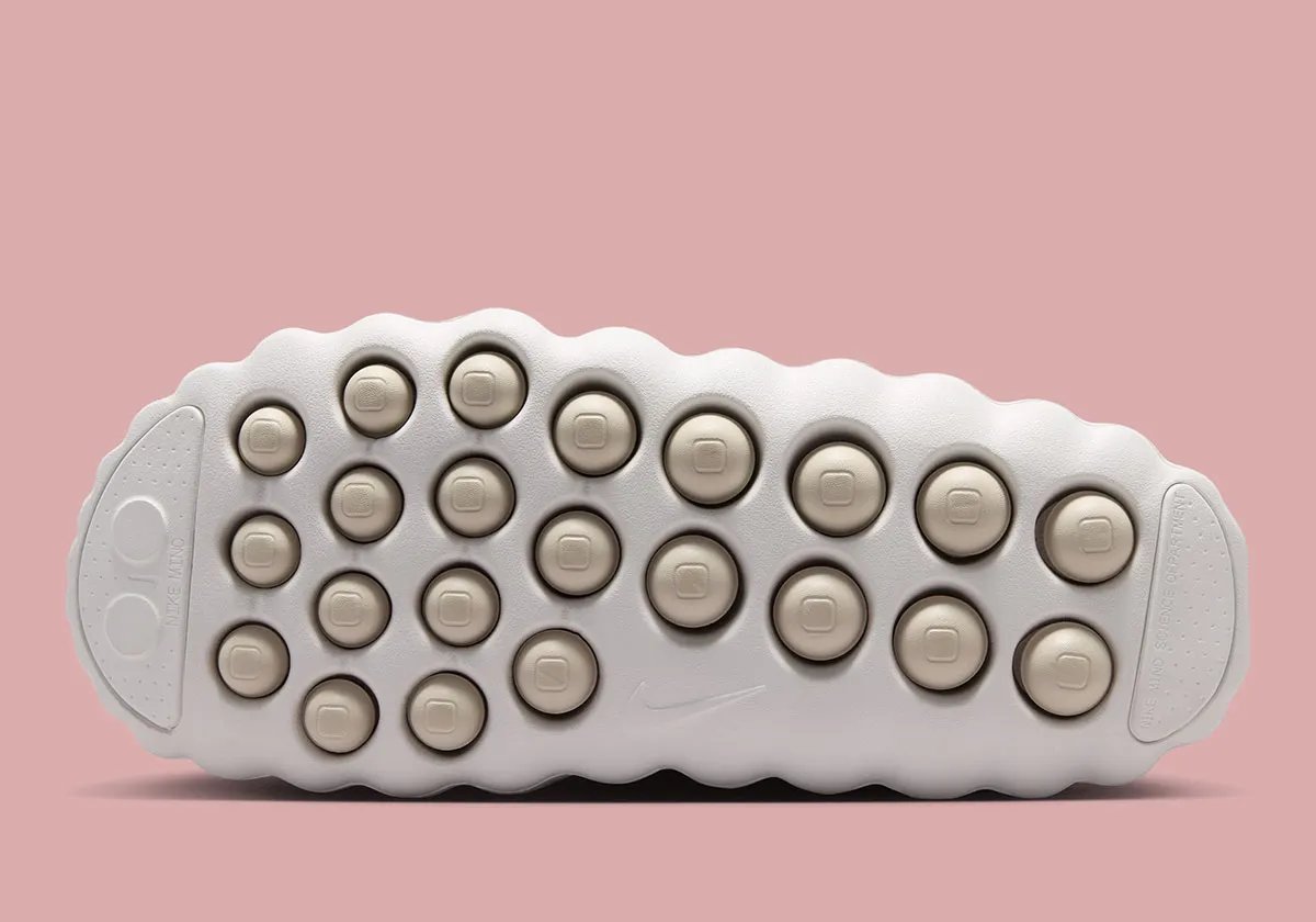 Nike Mind 001 recovery slide in Summit White with Metallic Silver Swoosh and light tan midsole, women's exclusive colorway - detail view 4