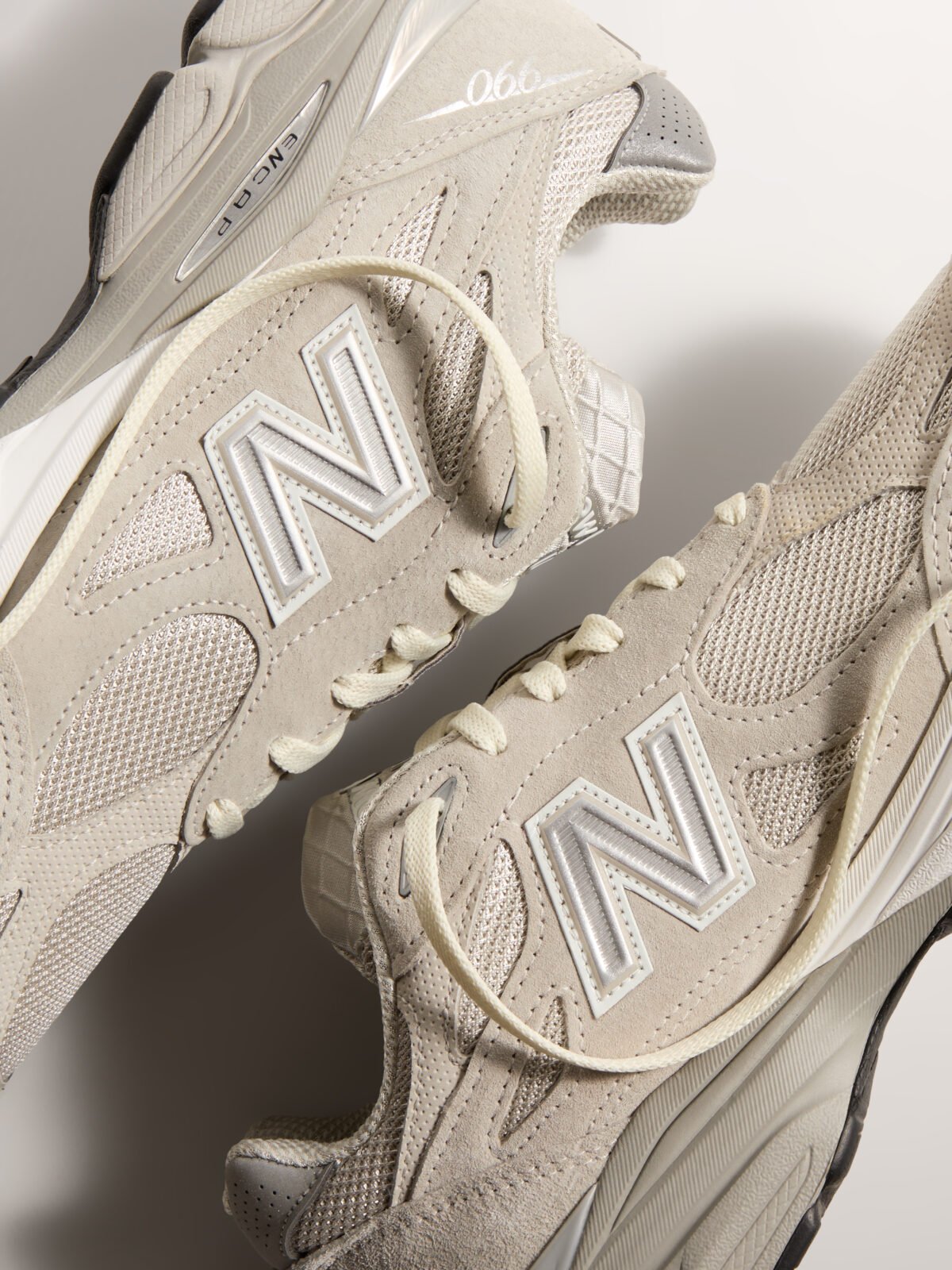 Kith x New Balance 99X Collection sneaker in neutral colorway, emphasizing Made in USA construction and heritage design - detail view 5