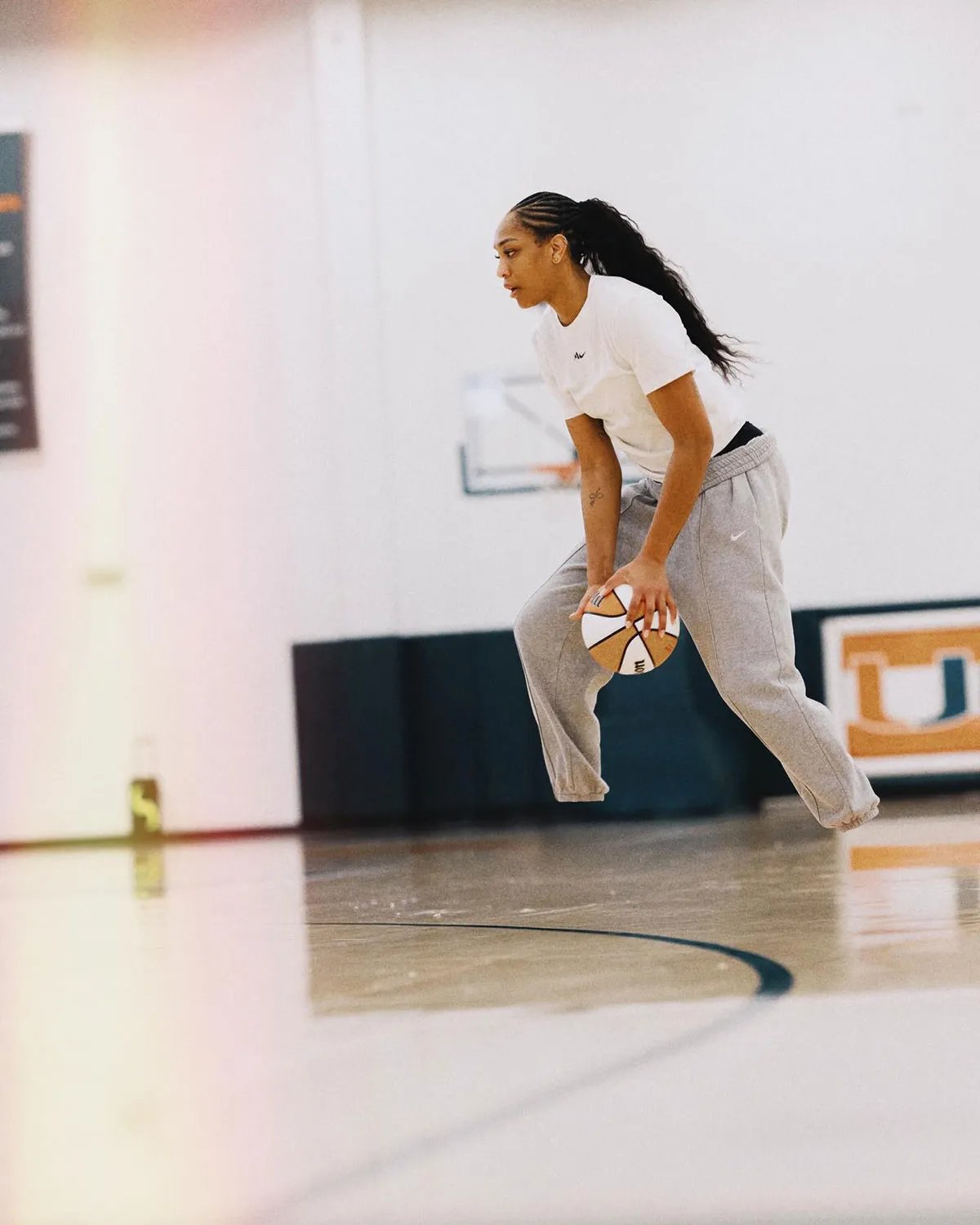 A'ja Wilson in Nike A'Two signature basketball shoe, professional player footwear - detail view 1