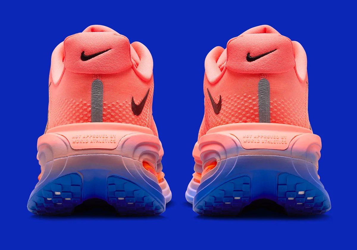 Nike Vomero Premium in Crimson and Blue colorway with gradient midsole detail and repositioned Nike Run tongue emblem - detail view 4