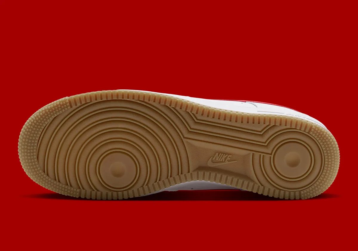 Nike Air Force 1 Low in White leather with Challenge Red Swoosh and Gum Light Brown outsole, shown from multiple angles - detail view 2