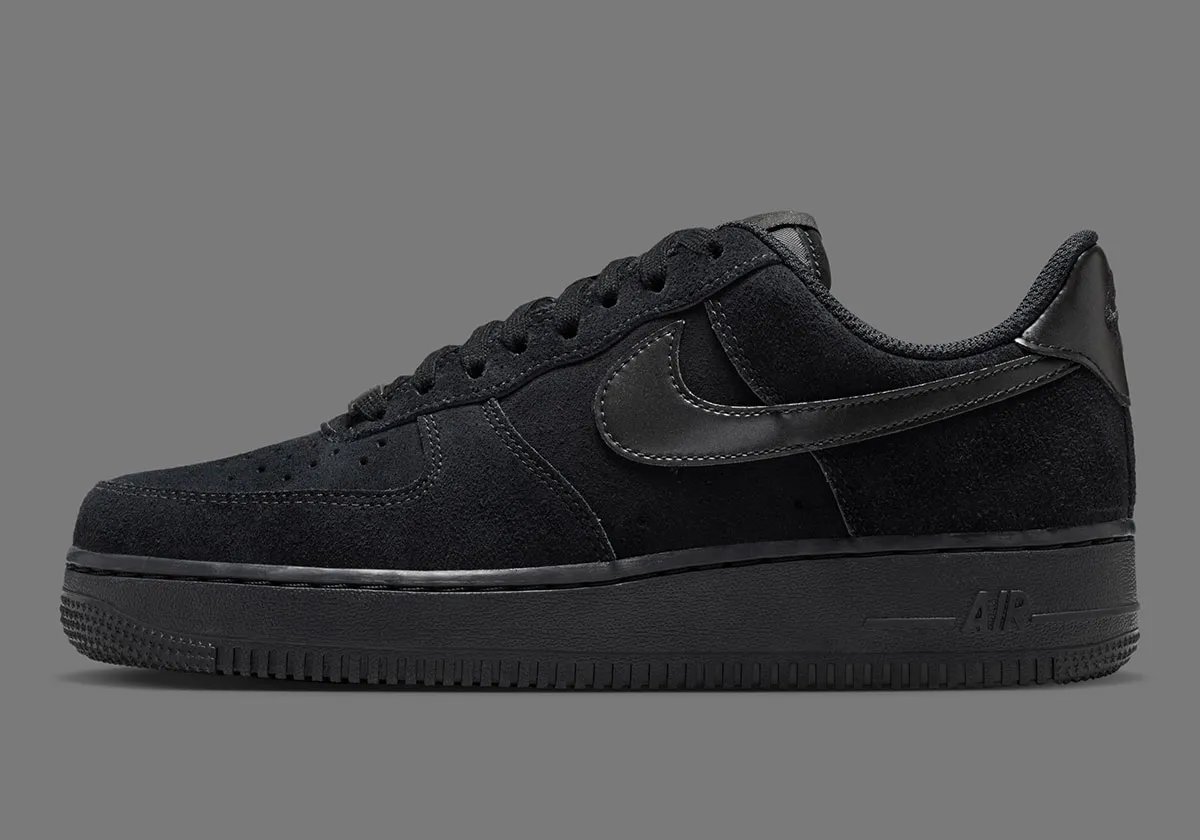 Nike Air Force 1 Low in premium suede with metallic branding details on Swoosh and heel - detail view 1