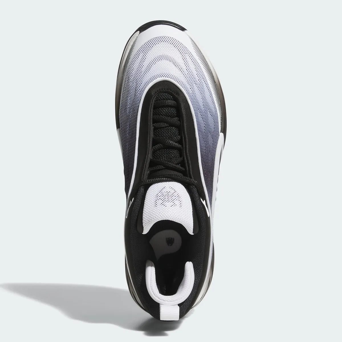 adidas D.O.N. Issue #8 'Yin and Yang' colorway showing inverted black and white design across both shoes - detail view 4