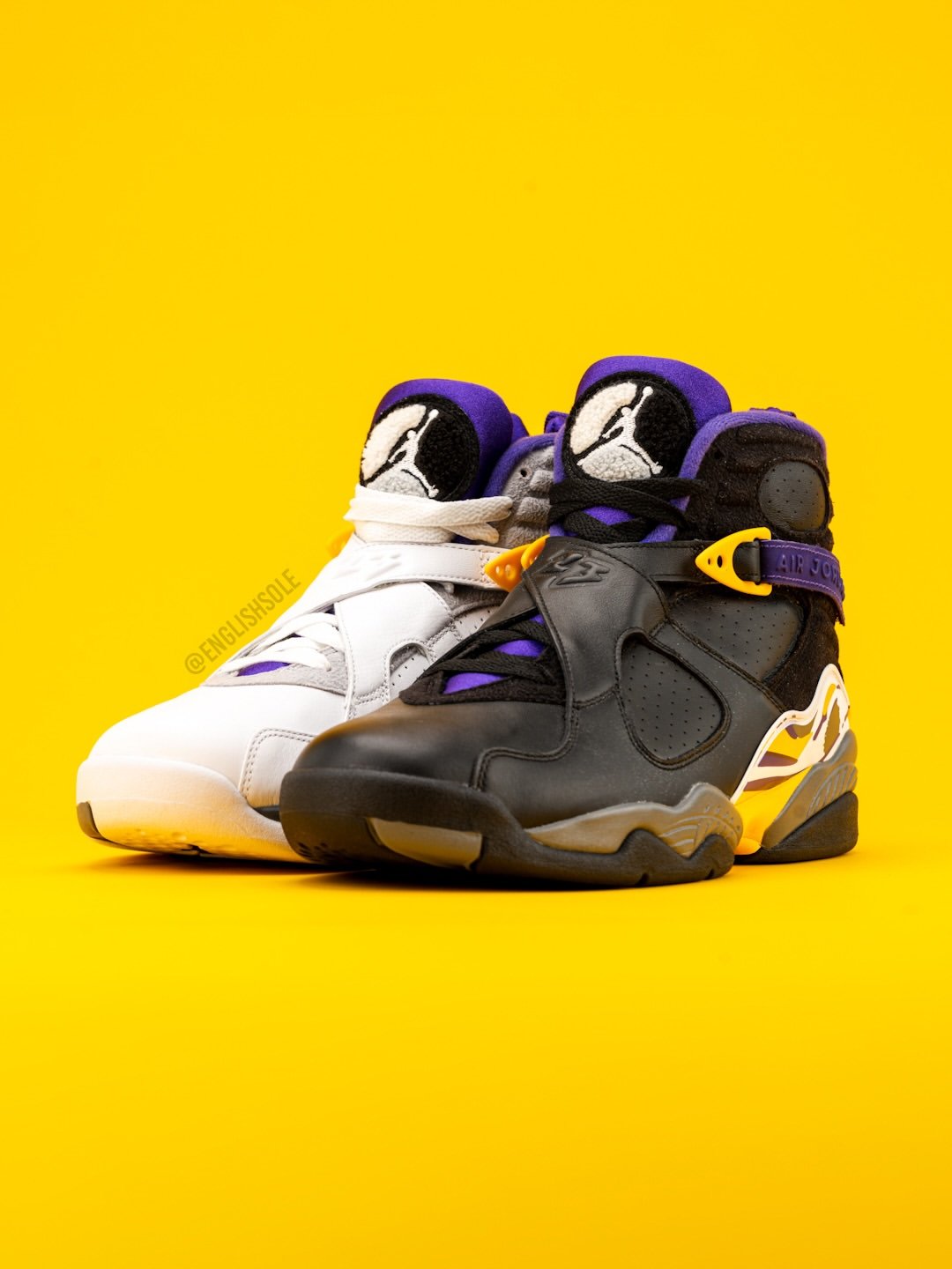 Kobe Bryant's Air Jordan 8 PE in white and black Lakers colorways, shown side by side - detail view 4