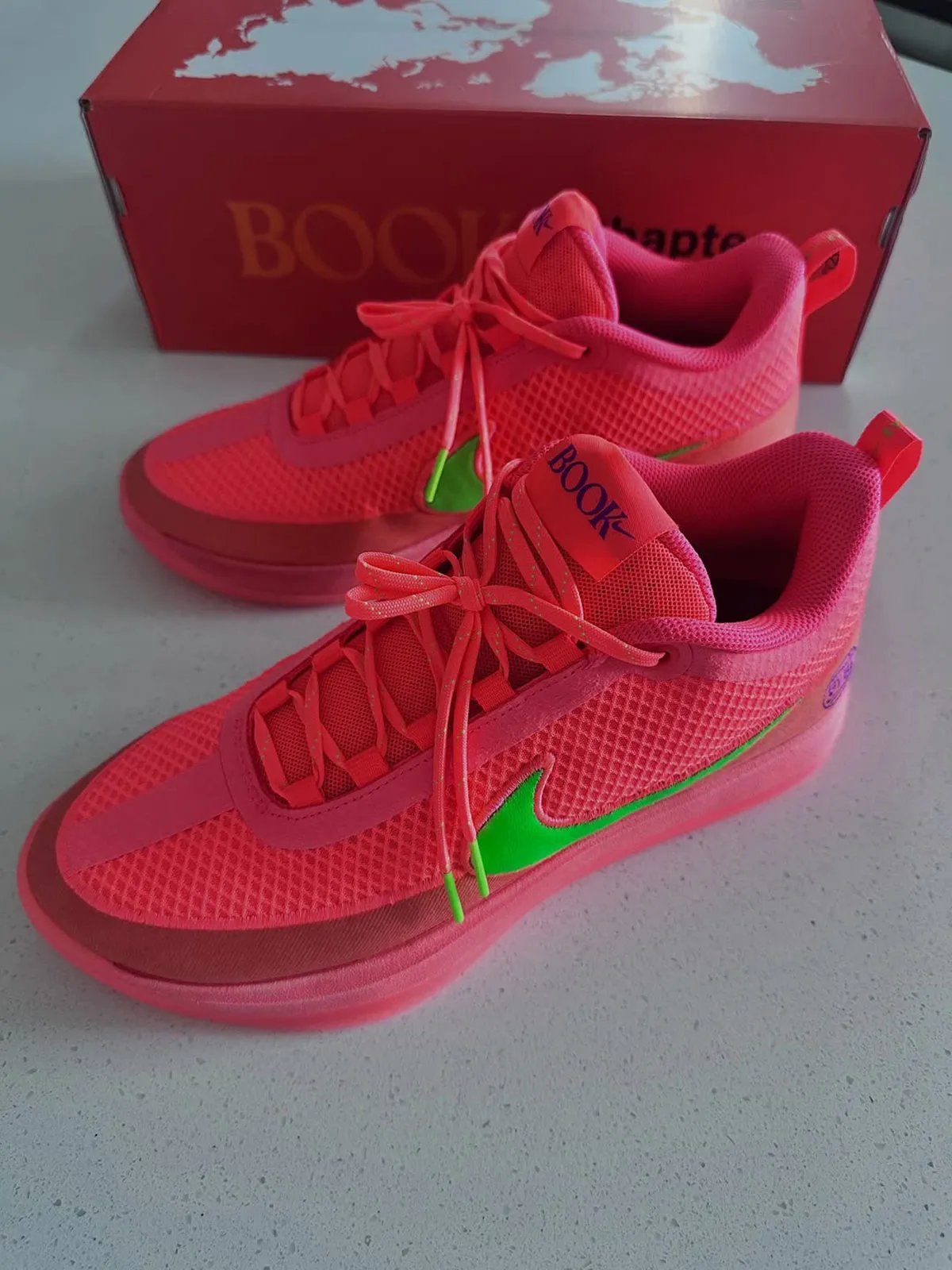 Nike Book 2 EYBL PE in pink and green colorway with chain-link mesh upper and purple accents - detail view 2