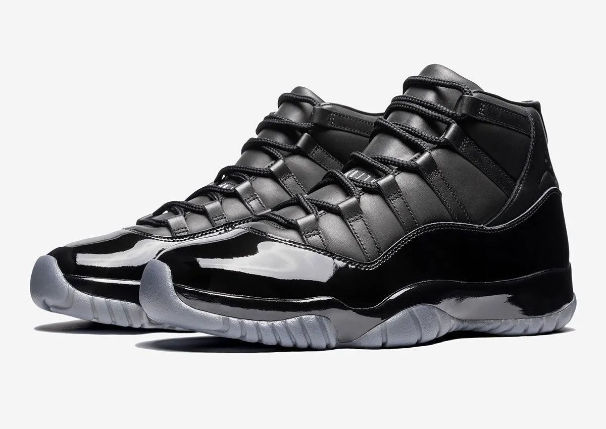 Comme des Garçons Homme Plus x Air Jordan 11 black and white colorways featuring premium cowhide leather and patent leather construction - detail view 3
