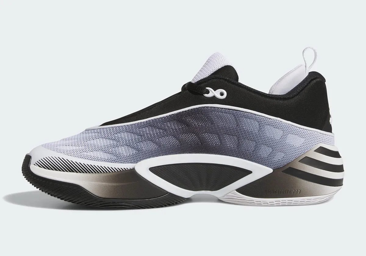 adidas D.O.N. Issue #8 'Yin and Yang' colorway showing inverted black and white design across both shoes - detail view 3