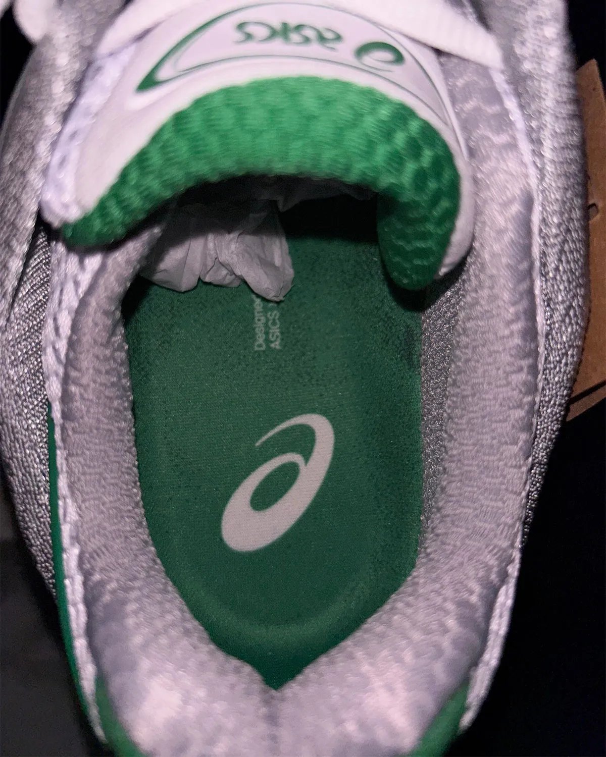 Hidden NY x ASICS GEL-Kinetic 2.0 collaboration featuring white upper with green heel overlay and half-tone ASICS strikes - detail view 5